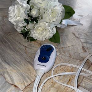 Brookstone Blue and White Control Device